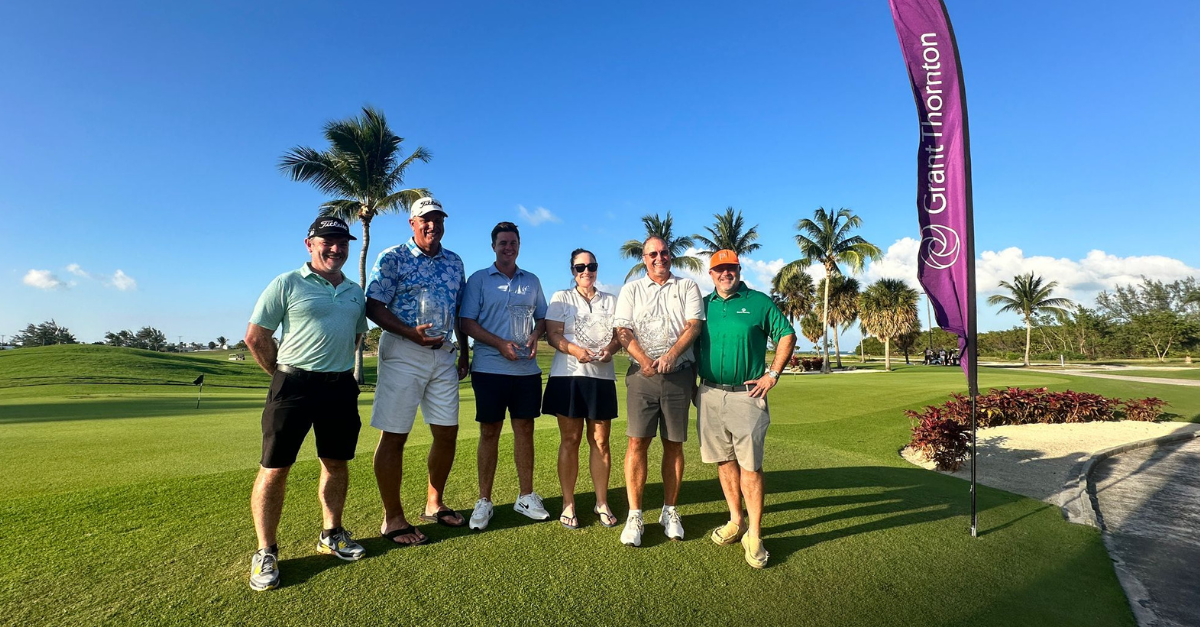 Championship division winners Isabel Mendes, Conor Glynn, Denis Corin and Scott Kapuscinski are joined by Daniel Fortune, President of the Cayman Islands Golf Association and Dara Kogh, Managing Partner of Grant Thornton Cayman Islands.
