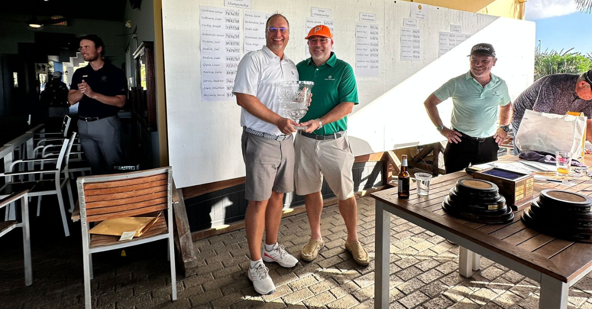 Senior Championship winner Denis Corin with Dara Keogh, Managing Partner of Grant Thornton Cayman Islands.