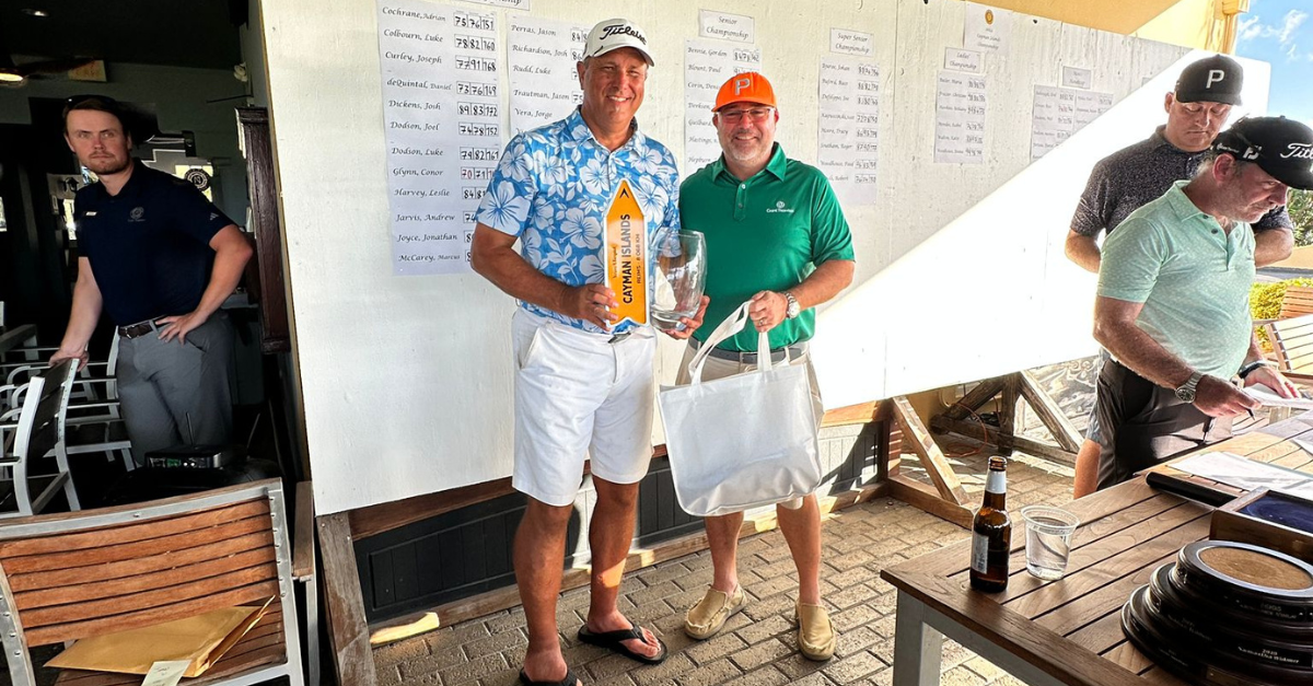 Super Senior Championship winner Scott Kapuscinski with Dara Keogh, Managing Partner of Grant Thornton Cayman Islands.