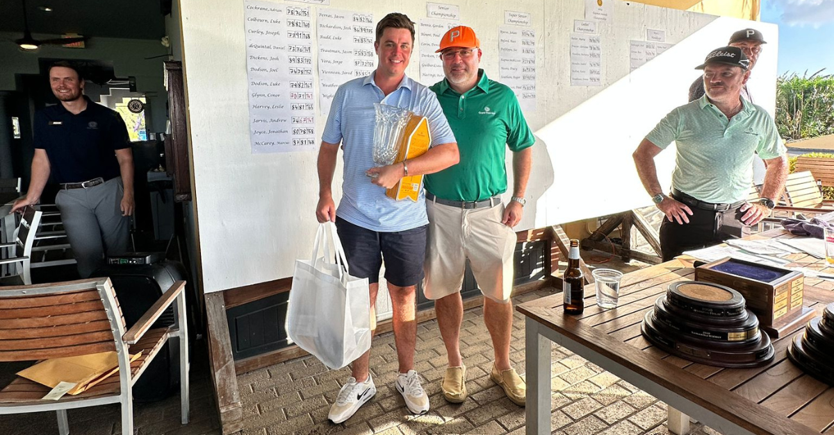 Men's Championship winner Conor Glynn with Dara Keogh, Managing Partner of Grant Thornton Cayman Islands